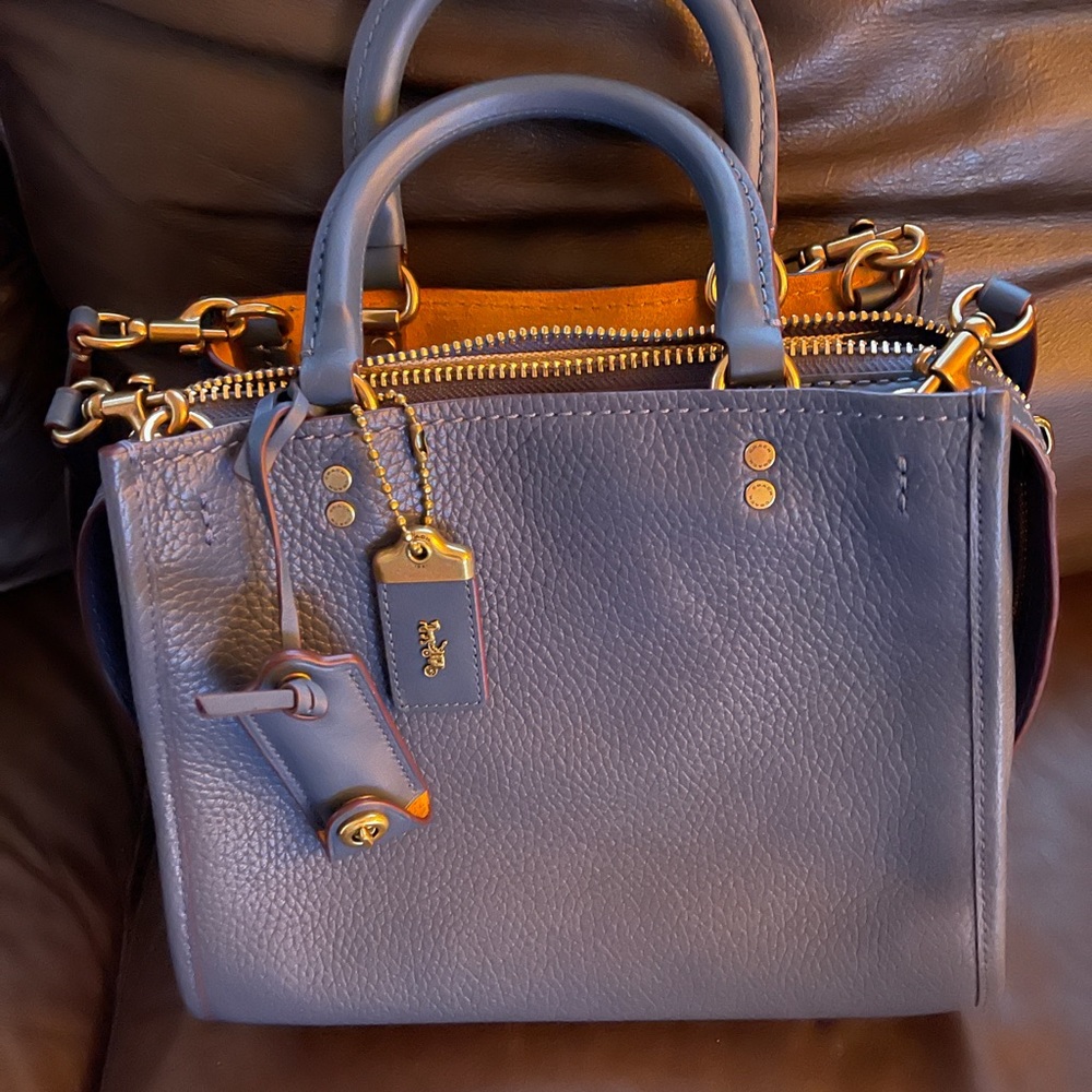 NWOT Coach Rogue 25